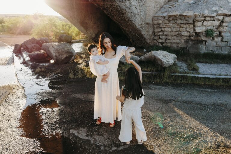 Mom with daughters in Carlsbad, NM under Eddy County Flume