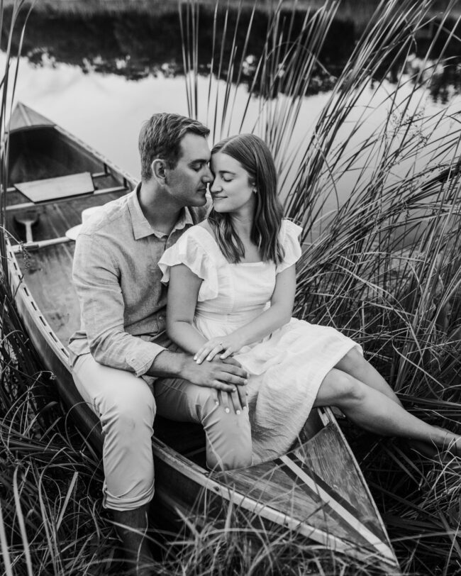Couple in canoe on lake